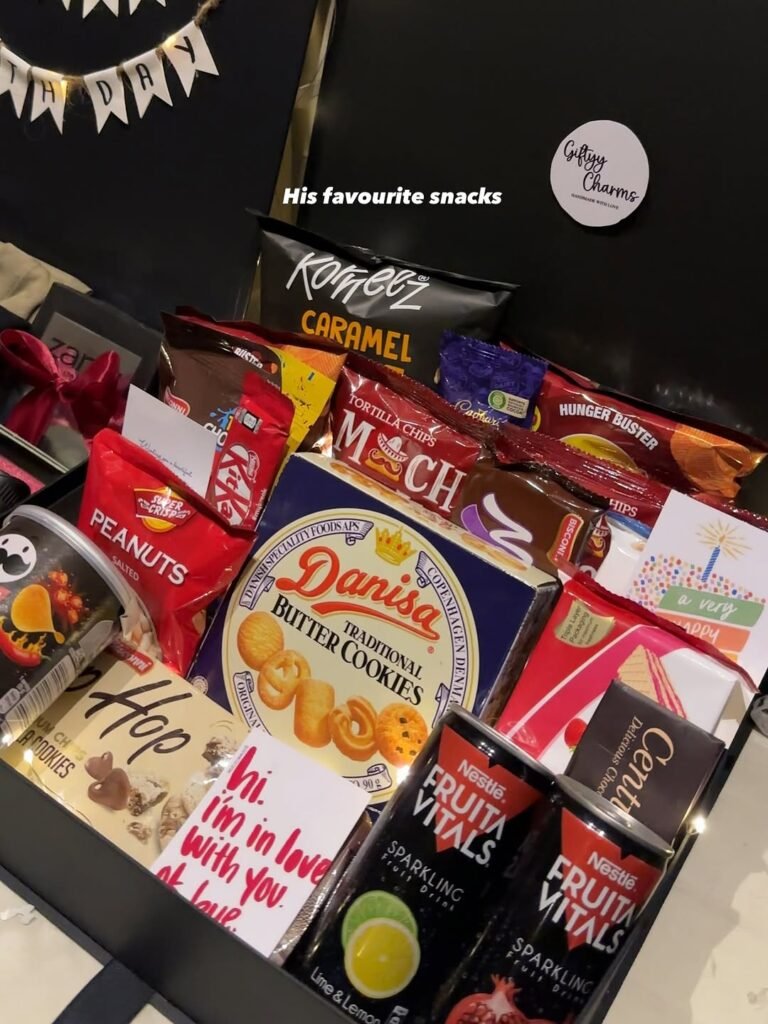 Premium birthday gift hamper with snacks chocolates and cookies